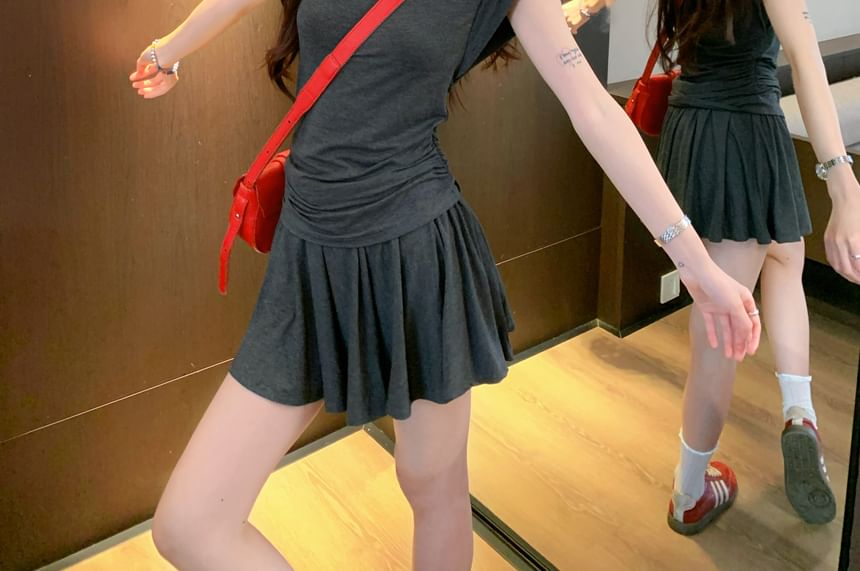 Two-Piece Set: V-Neck Tee and Mini Skirt