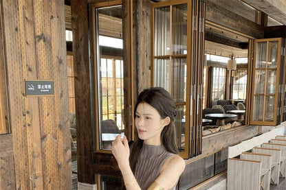 Sleeveless Mock Neck Plain Ribbed Knit Top / Mid Rise Leopard Print Midi A-Line Skirt