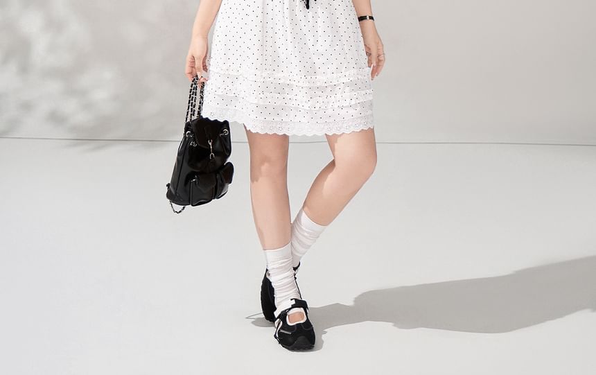 Tie-Neck Tee and Ruffled Mini Skirt