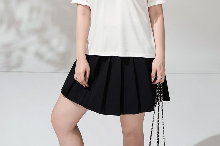 Round Neck Tee and Pleated Mini Skirt