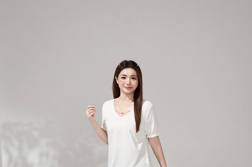 Round Neck Tee and Pleated Mini Skirt