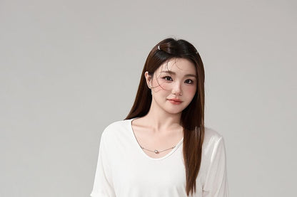 Round Neck Tee and Pleated Mini Skirt