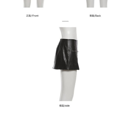 Short-Sleeve Cutout Crop top / Low Waist Faux Leather Mini Skirt