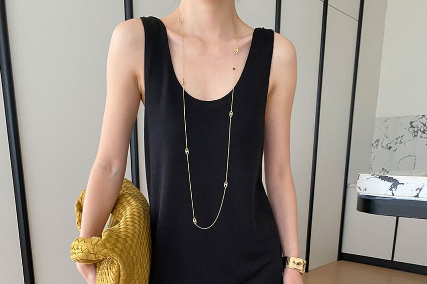 Set: Sleeveless Scoop Neck Knit Top + Flared Mid Rise Pants