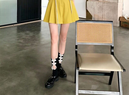 Perforated Knit Top and Pleated Skort Set