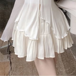 Flared-Sleeve Asymmetrical Tee, Cropped Camisole, and Mini A-Line Skirt