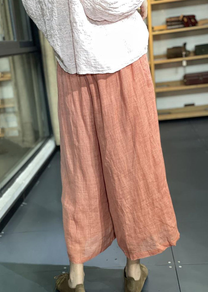 Pantalon large en lin à taille élastique avec poches orange simples pour l'été KK031