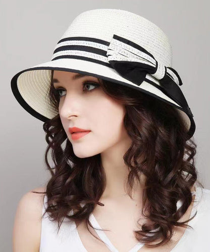 Chapeau de soleil polyvalent en paille tissée avec nœud blanc et pliable II049