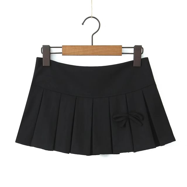 Low-Rise Bow Accent Pleated Slit Mini A-Line Skirt