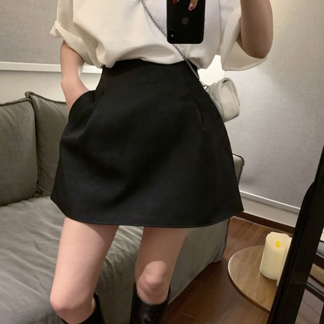 Plain High-Rise Flared Mini Skirt