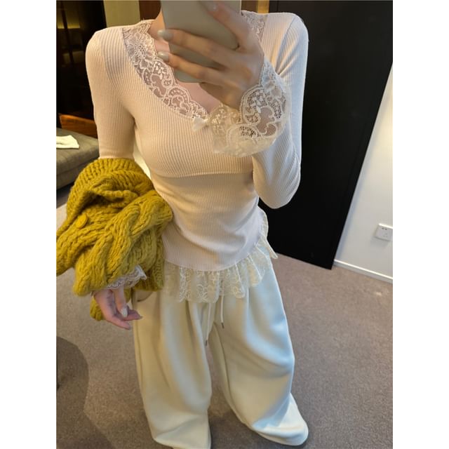 Crewneck Knit Sweater, Sleeveless Lace Camisole, and High-Waist Wide-Leg Trousers