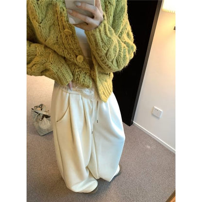 Crewneck Knit Sweater, Sleeveless Lace Camisole, and High-Waist Wide-Leg Trousers