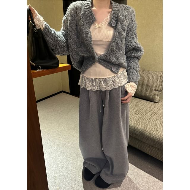 Crewneck Knit Sweater, Sleeveless Lace Camisole, and High-Waist Wide-Leg Trousers