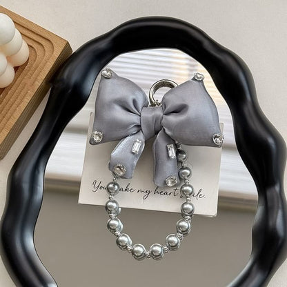 Charm Pearl with Faux Lanyard Bow Rhinestone Pad Phone