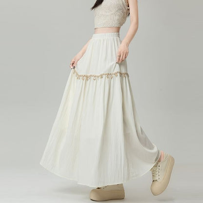 High-Rise Fringed Maxi Flared Skirt