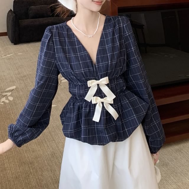 Peplum Blouse with Plaid Pattern and Bow Accent at V-Neck