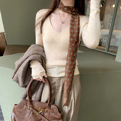 V-Neck Knit Top with Long Sleeves in Solid Color