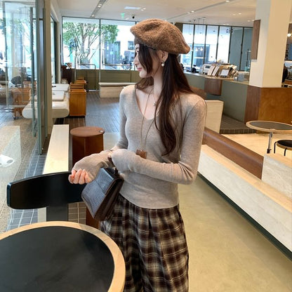 V-Neck Knit Top with Long Sleeves in Solid Color