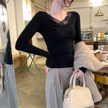V-Neck Top with Lace Trim and Long Sleeves in Solid Color