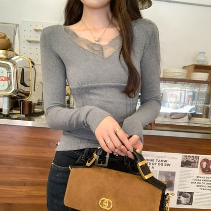 V-Neck Top with Lace Trim and Long Sleeves in Solid Color