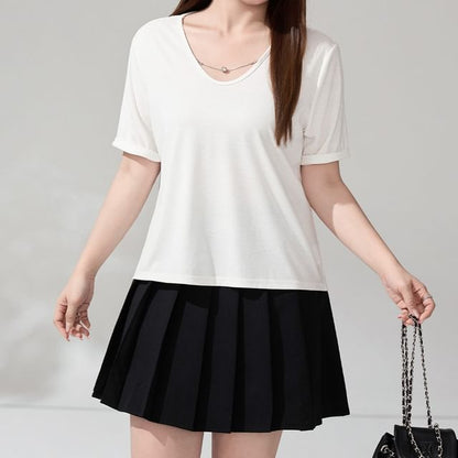 Round Neck Tee and Pleated Mini Skirt