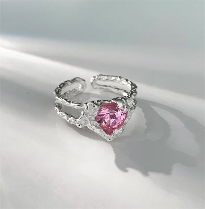 Verstellbarer Ring mit rosa Kristallherz