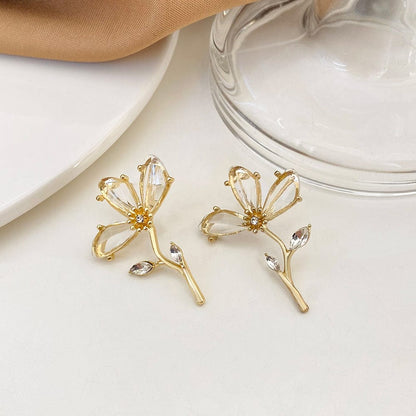 Boucles d'oreilles pendantes à motif floral chic