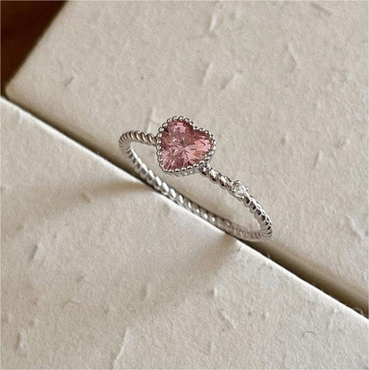 Schicker Herzring mit rosa CZ-Kristall