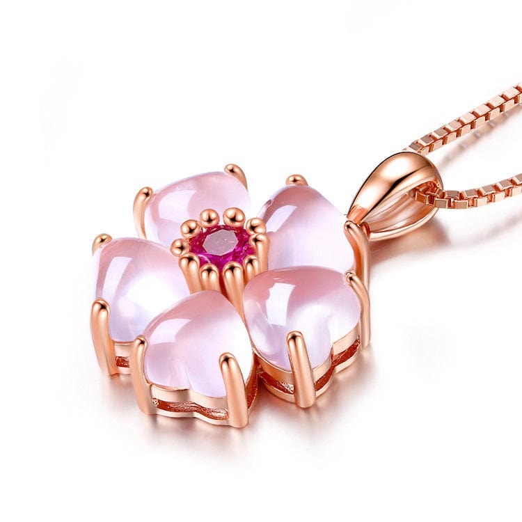 Collier avec pendentif en forme de cœur rose et fleur de cerisier