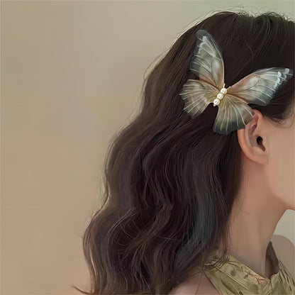 Pince à cheveux papillon en maille transparente nacrée