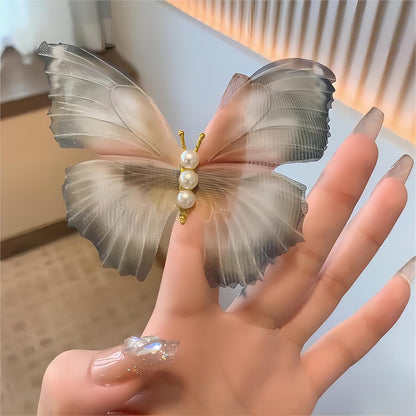 Pince à cheveux papillon en maille transparente nacrée