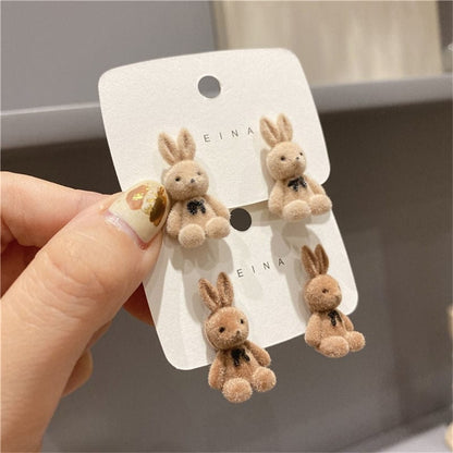 Clous d'oreilles en forme de lapin et d'ours