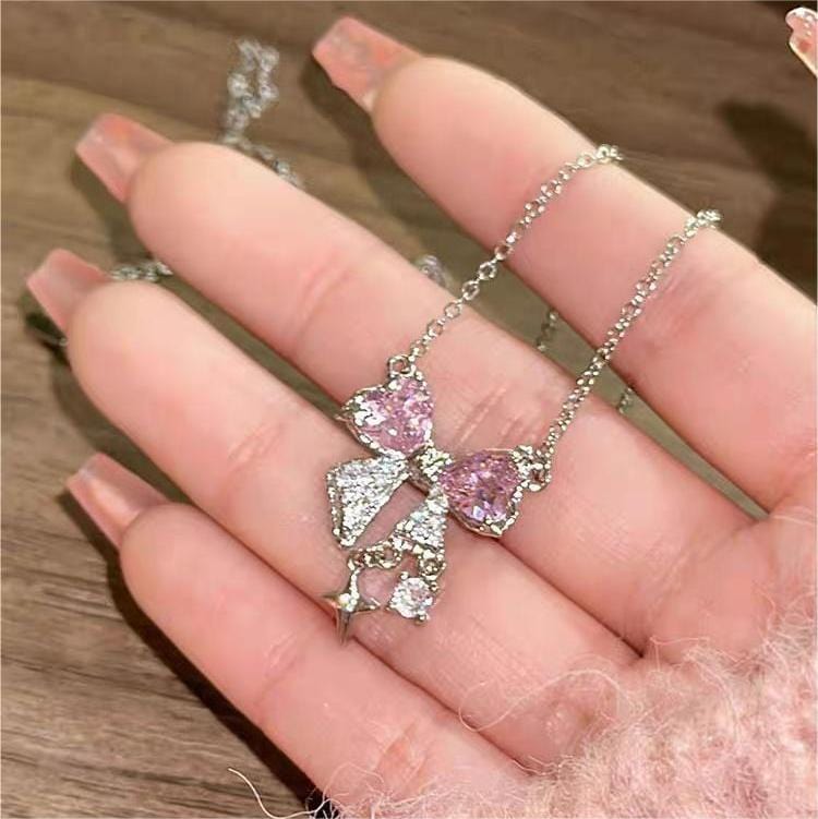 Collier chaîne en cristal avec nœud papillon GEM001