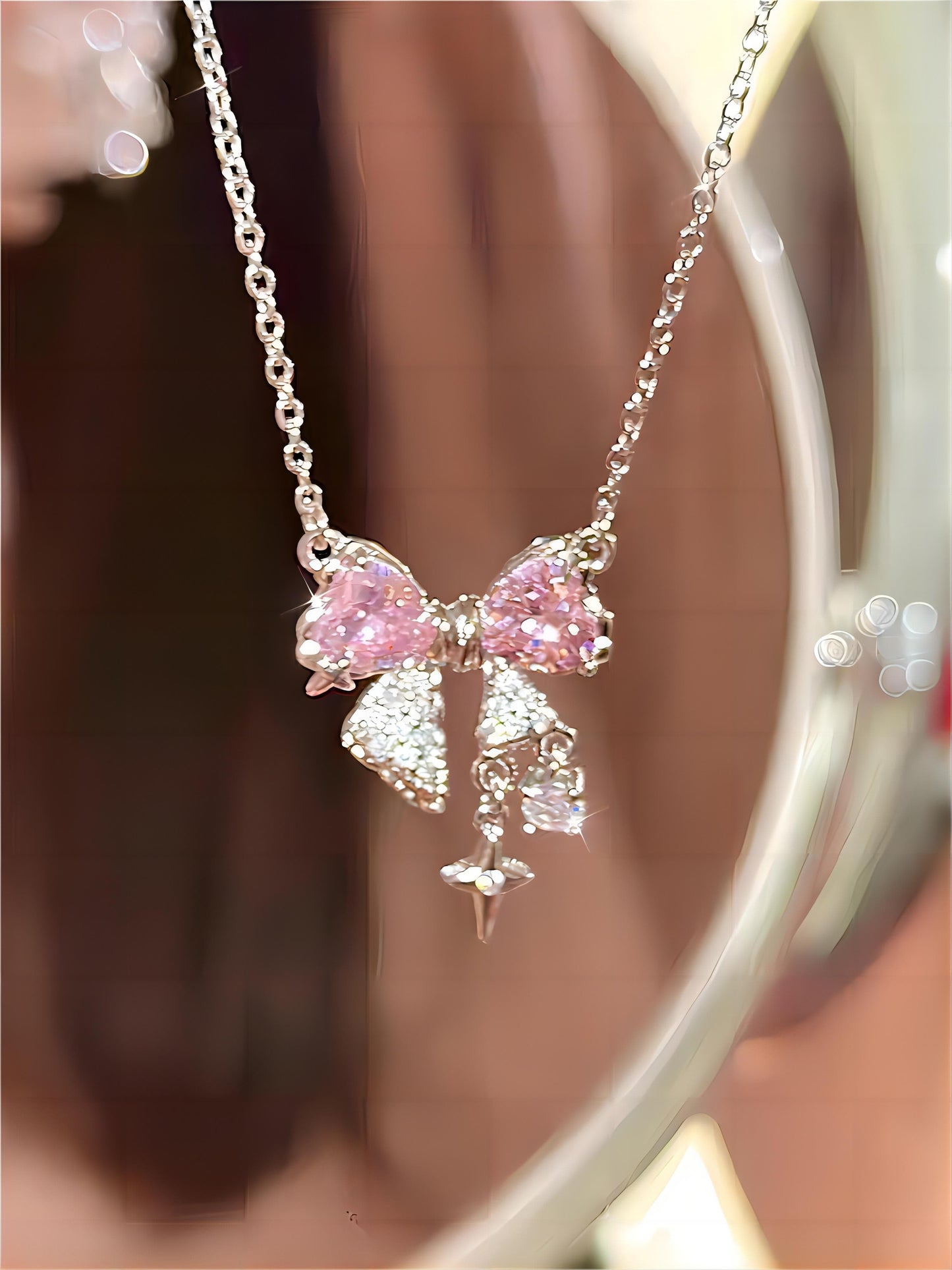 Collier chaîne en cristal avec nœud papillon GEM001