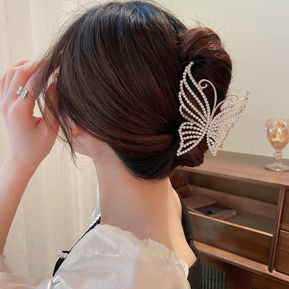 Pince à cheveux en forme de papillon avec perles en cristal géométriques